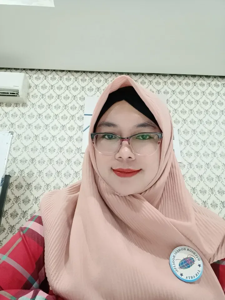 Rita Mulyanti, S.E., M.Pd